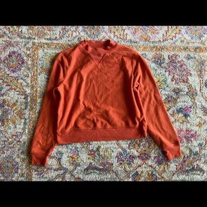 Orange fleece sweatshirt